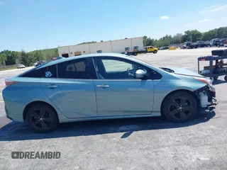 2016 Toyota Prius Four z VIN JTDKARFU0G3016597, wystawiony jako IAAI lot #42034214 z przebiegiem 125 799 mil mil oraz . Historia ofert i sprzedaży dostępna na DreamBid. Obrazek 13.