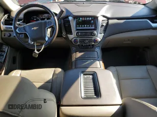 2019 Chevrolet Suburban Premier with VIN 1GNSKJKC6KR293389, listed as a Copart auction lot 77700264 with 49,057 mi miles and Salvage Title. Bid and sale history available at DreamBid. Image 8.