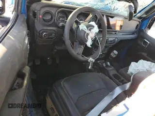 2024 Jeep Wrangler Rubicon z VIN 1C4PJXCG1RW298288, wystawiony jako Copart lot #81371914 z przebiegiem 4 445 mil mil oraz Szkoda całkowita • Salvage title. Historia ofert i sprzedaży dostępna na DreamBid. Obrazek 8.