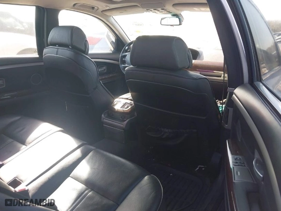 2007 BMW 7 Series 750Li with VIN WBAHN83597DT65335, listed as a IAAI auction lot 41738807 with 125,228 mi miles. Bid and sale history available at carsss.com. Image 8.
