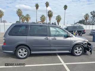 2006 Mazda MPV LX z VIN JM3LW28AX60564341, wystawiony jako IAAI lot #41578466 z przebiegiem 126 356 mil mil oraz . Historia ofert i sprzedaży dostępna na DreamBid. Obrazek 13.
