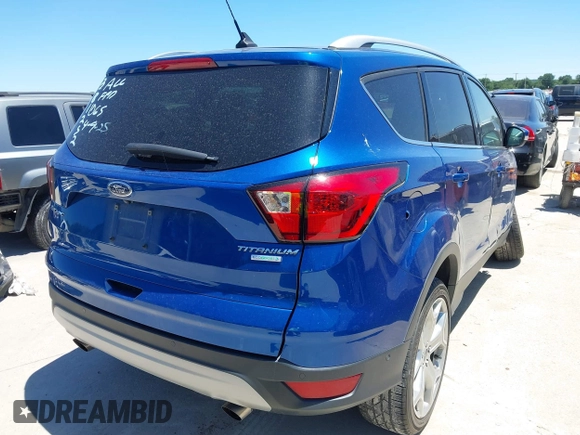 2019 Ford Escape Titanium с VIN 1FMCU0J96KUC34410, выставлен на аукционе IAAI как лот 42309333 с пробегом 88 357 миль миль и . История ставок и продаж доступна на DreamBid. Изображение 4.