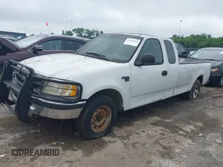1998 Ford F-150 with VIN 1FTZX1763WKC13105, listed as a IAAI auction lot 42546968 with 181,258 mi miles and . Bid and sale history available at DreamBid. Image 2.