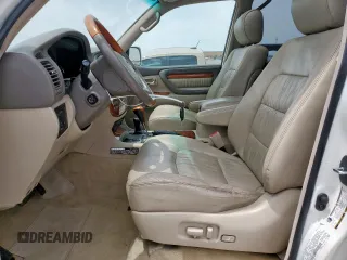 2004 Lexus LX 470 z VIN JTJHT00W743542910, wystawiony jako Copart lot #57187445 z przebiegiem 236 985 mil mil oraz Szkoda całkowita • Salvage title. Historia ofert i sprzedaży dostępna na DreamBid. Obrazek 7.