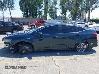 2018 Honda Clarity Touring with VIN JHMZC5F39JC022655, listed as a IAAI auction lot 42149002 with 118,913 mi miles. Bid and sale history available at carsss.com. Image 14.