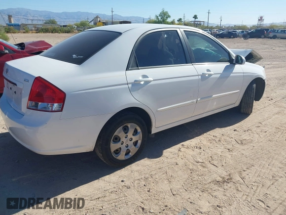 2009 Kia Spectra EX with VIN KNAFE222695588022, listed as a IAAI auction lot 42106609 with 153,688 mi miles. Bid and sale history available at carsss.com. Image 4.