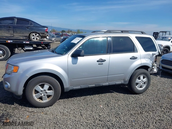 2010 Ford Escape XLT with VIN 1FMCU9D70AKD46774, listed as a IAAI auction lot 41857882 with 93,409 mi miles. Bid and sale history available at carsss.com. Image 14.