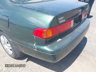 2000 Toyota Camry CE z VIN 4T1BG28K9YU968930, wystawiony jako IAAI lot #42310350 z przebiegiem 190 762 mil mil oraz . Historia ofert i sprzedaży dostępna na DreamBid. Obrazek 6.