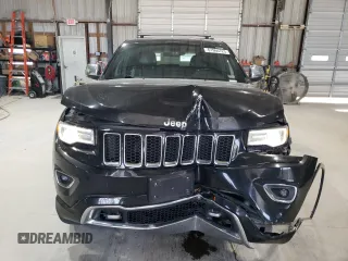 2015 Jeep Grand Cherokee Overland with VIN 1C4RJFCG0FC783375, listed as a Copart auction lot 61966725 with 191,478 mi miles and Salvage title. Bid and sale history available at DreamBid. Image 5.