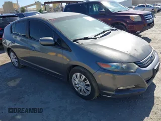 2010 Honda Insight LX z VIN JHMZE2H5XAS033628, wystawiony jako IAAI lot #42326613 z przebiegiem 239 068 mil mil oraz . Historia ofert i sprzedaży dostępna na DreamBid. Obrazek 1.