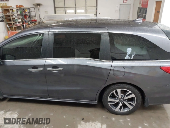 2021 Honda Odyssey Touring with VIN 5FNRL6H86MB026038, listed as a IAAI auction lot 41735249 with 68,480 mi miles. Bid and sale history available at carsss.com. Image 14.