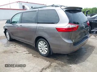2015 Toyota Sienna Limited z VIN 5TDDK3DC6FS111675, wystawiony jako IAAI lot #42240747 z przebiegiem 124 967 mil mil oraz . Historia ofert i sprzedaży dostępna na DreamBid. Obrazek 3.