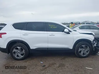 2023 Hyundai Santa Fe SE with VIN 5NMS14AJ3PH637561, listed as a IAAI auction lot 41905620 with 5,937 mi miles and . Bid and sale history available at DreamBid. Image 14.