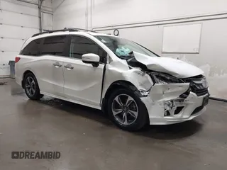 2019 Honda Odyssey Touring with VIN 5FNRL6H8XKB079113, listed as a IAAI auction lot 42359455 with 74,545 mi miles and . Bid and sale history available at DreamBid. Image 1.