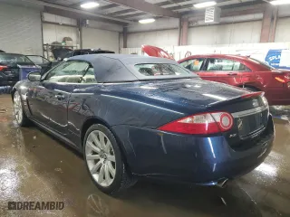 2007 Jaguar XK with VIN SAJDA44BX75B00447, listed as a Copart auction lot 50147695 with 119,467 mi miles and Salvage Title. Bid and sale history available at carsss.com. Image 2.