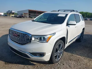 2018 GMC Acadia Denali with VIN 1GKKNPLS3JZ148659, listed as a IAAI auction lot 42158711 with 104,698 mi miles and . Bid and sale history available at DreamBid. Image 2.