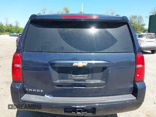 2020 Chevrolet Tahoe LT with VIN 1GNSKBKC6LR239081, listed as a IAAI auction lot 42298842 with 125,328 mi miles and . Bid and sale history available at DreamBid. Image 16.
