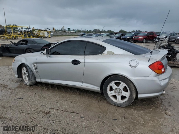 2003 Hyundai Tiburon GT with VIN KMHHN65F23U084299, listed as a Copart auction lot 75105394 with 90,598 mi miles and Clean Title. Bid and sale history available at carsss.com. Image 2.
