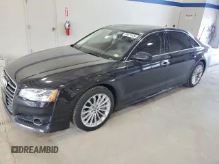 2016 Audi A8 L 4.0T Sport with VIN WAU43AFD1GN011589, listed as a Copart auction lot 86614934 with 96,137 mi miles and Salvage Title. Bid and sale history available at carsss.com. Image 1.