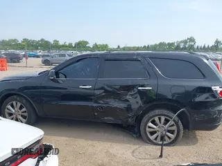 2013 Dodge Durango Crew z VIN 1C4RDJDG3DC685995, wystawiony jako IAAI lot #42490067 z przebiegiem 205 806 mil mil oraz . Historia ofert i sprzedaży dostępna na DreamBid. Obrazek 14.