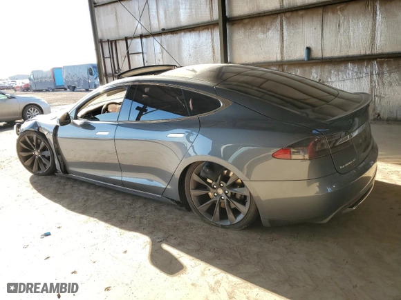 2013 Tesla Model S Performance with VIN 5YJSA1CPXDFP24886, listed as a Copart auction lot 49957485 with 113952 miles and Salvage Title. Bid and sale history available at carsss.com. Image 2.