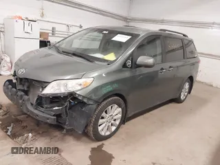 2011 Toyota Sienna XLE with VIN 5TDDK3DC0BS008343, listed as a IAAI auction lot 41444268 with 215,778 mi miles. Bid and sale history available at carsss.com. Image 2.