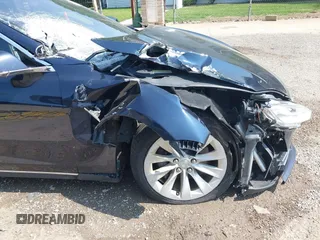 2014 Tesla Model S 60 with VIN 5YJSA1H17EFP65983, listed as a IAAI auction lot 42399288 with 166,365 mi miles and . Bid and sale history available at DreamBid. Image 20.