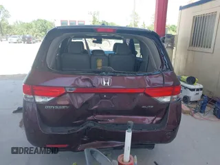 2014 Honda Odyssey Touring with VIN 5FNRL5H90EB080889, listed as a IAAI auction lot 42085305 with 123,286 mi miles and . Bid and sale history available at carsss.com. Image 6.