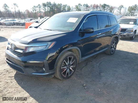 2019 Honda Pilot Touring 8-Passenger with VIN 5FNYF5H94KB029572, listed as a IAAI auction lot 41729215 with 149,799 mi miles. Bid and sale history available at carsss.com. Image 2.