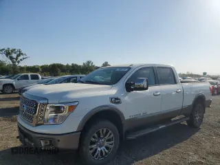 2017 Nissan Titan XD PRO-4X with VIN 1N6BA1F44HN541022, listed as a Copart auction lot 73966134 with 66,582 mi miles and Salvage Title. Bid and sale history available at carsss.com. Image 1.