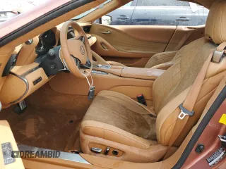 2024 Lexus LC 500h с VIN JTHMPAAY4RA110109, выставлен на аукционе Copart как лот 76007344 с пробегом Не указан миль и На запчасти • Non repairable. История ставок и продаж доступна на DreamBid. Изображение 7.
