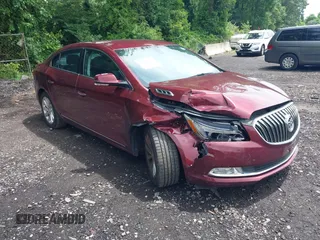 2014 Buick LaCrosse Leather z VIN 1G4GB5G32EF292398, wystawiony jako IAAI lot #42646304 z przebiegiem 84 567 mil mil oraz . Historia ofert i sprzedaży dostępna na DreamBid. Obrazek 1.