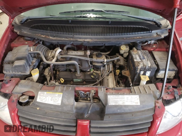 2007 Dodge Grand Caravan SE with VIN 1D4GP24RX7B249213, listed as a Copart auction lot 72547894 with 104,636 mi miles and Clean Title. Bid and sale history available at DreamBid. Image 12.