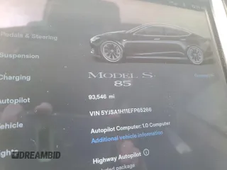 2014 Tesla Model S 60 with VIN 5YJSA1H11EFP65266, listed as a Copart auction lot 60934805 with 93,546 mi miles and Salvage title. Bid and sale history available at DreamBid. Image 9.