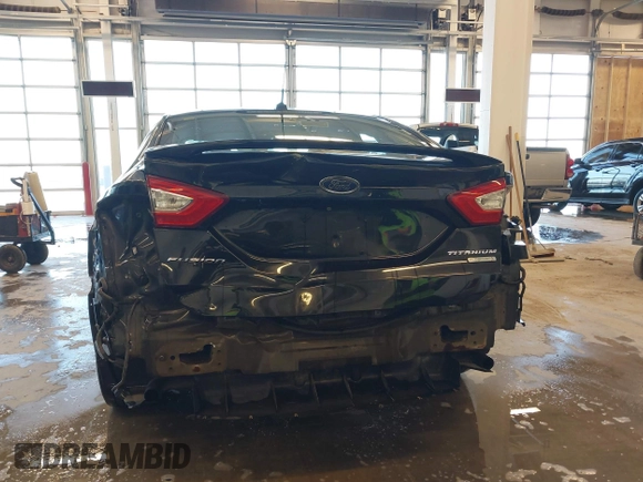 2014 Ford Fusion Titanium with VIN 3FA6P0K93ER115805, listed as a IAAI auction lot 41009602 with 136,021 mi miles. Bid and sale history available at carsss.com. Image 17.