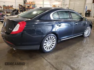 2014 Lincoln MKS with VIN 1LNHL9DK3EG611354, listed as a Copart auction lot 49008525 with 114,232 mi miles and Salvage Title. Bid and sale history available at carsss.com. Image 3.