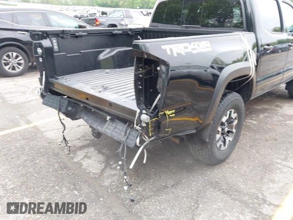 2021 Toyota Tacoma SR with VIN 3TMCZ5AN0MM417261, listed as a IAAI auction lot 42240693 with 38,625 mi miles and . Bid and sale history available at DreamBid. Image 21.