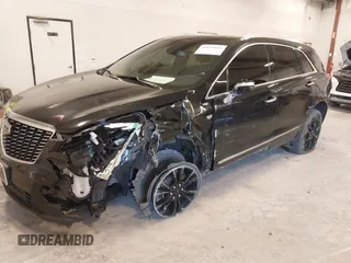 2021 Cadillac XT5 AWD Premium Luxury with VIN 1GYKNDR41MZ129884, listed as a IAAI auction lot 41835444 with 61,878 mi miles and . Bid and sale history available at DreamBid. Image 6.