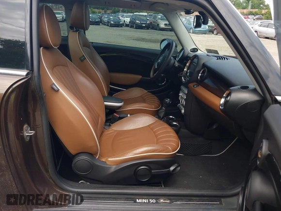 2010 MINI Hardtop with VIN WMWMF3C55ATZ23127, listed as a IAAI auction lot 42667783 with 61,954 mi miles and . Bid and sale history available at DreamBid. Image 5.