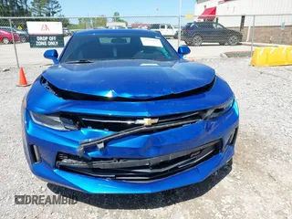 2018 Chevrolet Camaro 1LT z VIN 1G1FB1RS5J0101768, wystawiony jako IAAI lot #41990965 z przebiegiem 82 492 mil mil oraz . Historia ofert i sprzedaży dostępna na DreamBid. Obrazek 6.