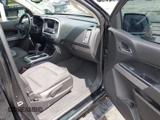 2021 Chevrolet Colorado 2WD LT z VIN 1GCGSCEN1M1131727, wystawiony jako IAAI lot #42181484 z przebiegiem 54 764 mil mil oraz . Historia ofert i sprzedaży dostępna na DreamBid. Obrazek 5.