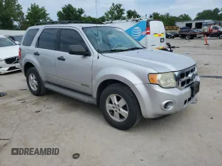 2008 Ford Escape XLS with VIN 1FMCU02Z88KE22266, listed as a Copart auction lot 63067385 with 214,026 mi miles and Salvage title. Bid and sale history available at DreamBid. Image 4.