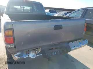 2000 Toyota Tundra SR5 with VIN 5TBRT3413YS019873, listed as a IAAI auction lot 41412497 with 305,472 mi miles and . Bid and sale history available at DreamBid. Image 6.