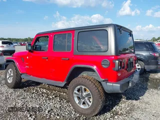 2020 Jeep Wrangler Unlimited Sahara High Altitude with VIN 1C4HJXEG2LW182641, listed as a IAAI auction lot 40130890 with 79,984 mi miles and . Bid and sale history available at DreamBid. Image 3.