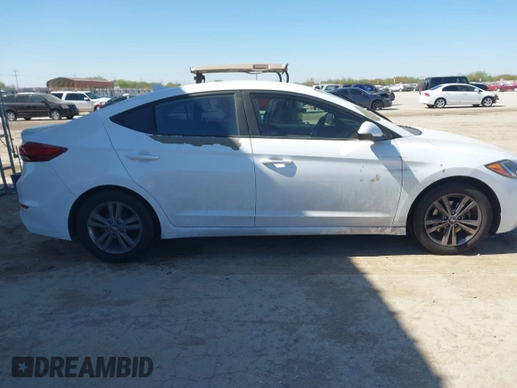 2017 Hyundai Elantra SE z VIN 5NPD84LF7HH129904, wystawiony jako IAAI lot #41837435 z przebiegiem 97 737 mil mil oraz . Historia ofert i sprzedaży dostępna na DreamBid. Obrazek 14.