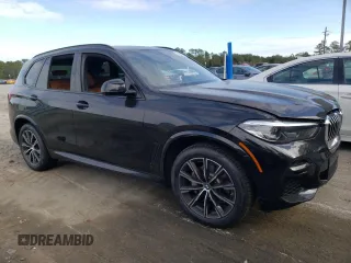 2022 BMW X5 xDrive40i with VIN 5UXCR6C05N9M87988, listed as a Copart auction lot 70896652 with 571 mi miles. Bid and sale history available at carsss.com. Image 4.