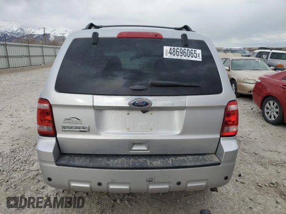 2012 Ford Escape Limited with VIN 1FMCU0E76CKC45168, listed as a Copart auction lot 48696065 with 185,205 mi miles and Salvage Title. Bid and sale history available at carsss.com. Image 6.