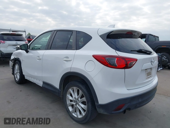 2013 Mazda CX-5 Grand Touring with VIN JM3KE2DEXD0166115, listed as a IAAI auction lot 41919164 with 102,999 mi miles and . Bid and sale history available at carsss.com. Image 3.