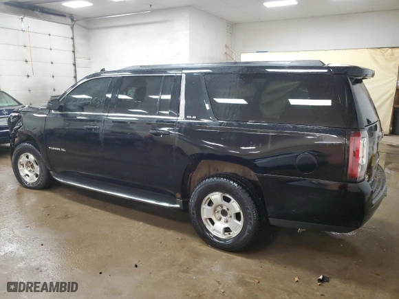 2016 GMC Yukon XL SLE with VIN 1GKS2FKCXGR105975, listed as a Copart auction lot 87233634 with 183,463 mi miles and Clean Title. Bid and sale history available at carsss.com. Image 2.