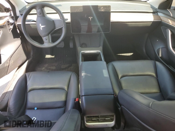 2023 Tesla Model 3 with VIN 5YJ3E1EA8PF704349, listed as a Copart auction lot 60220665 with 18,873 mi miles and Non repairable. Bid and sale history available at DreamBid. Image 8.